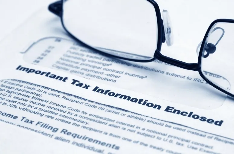 Can You Get The IRS To Reconsider A Tax Assessment? 1 Glasses on paper with “Important Tax Information Enclosed”